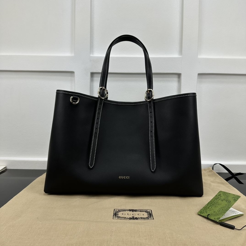 G*u*i shopping bags
